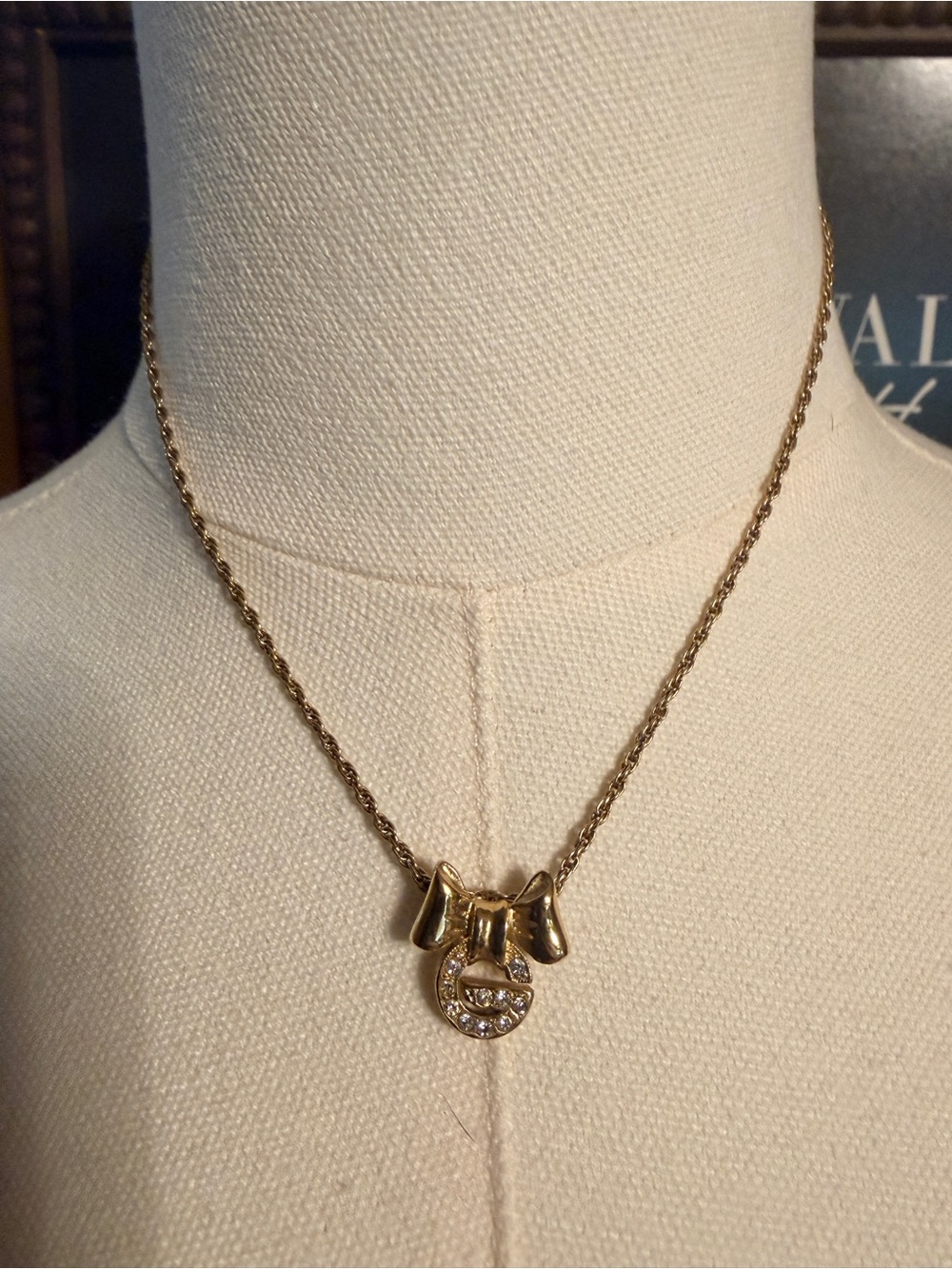 Givenchy Gold Bow Necklace with Crystal-Embellished Pendant